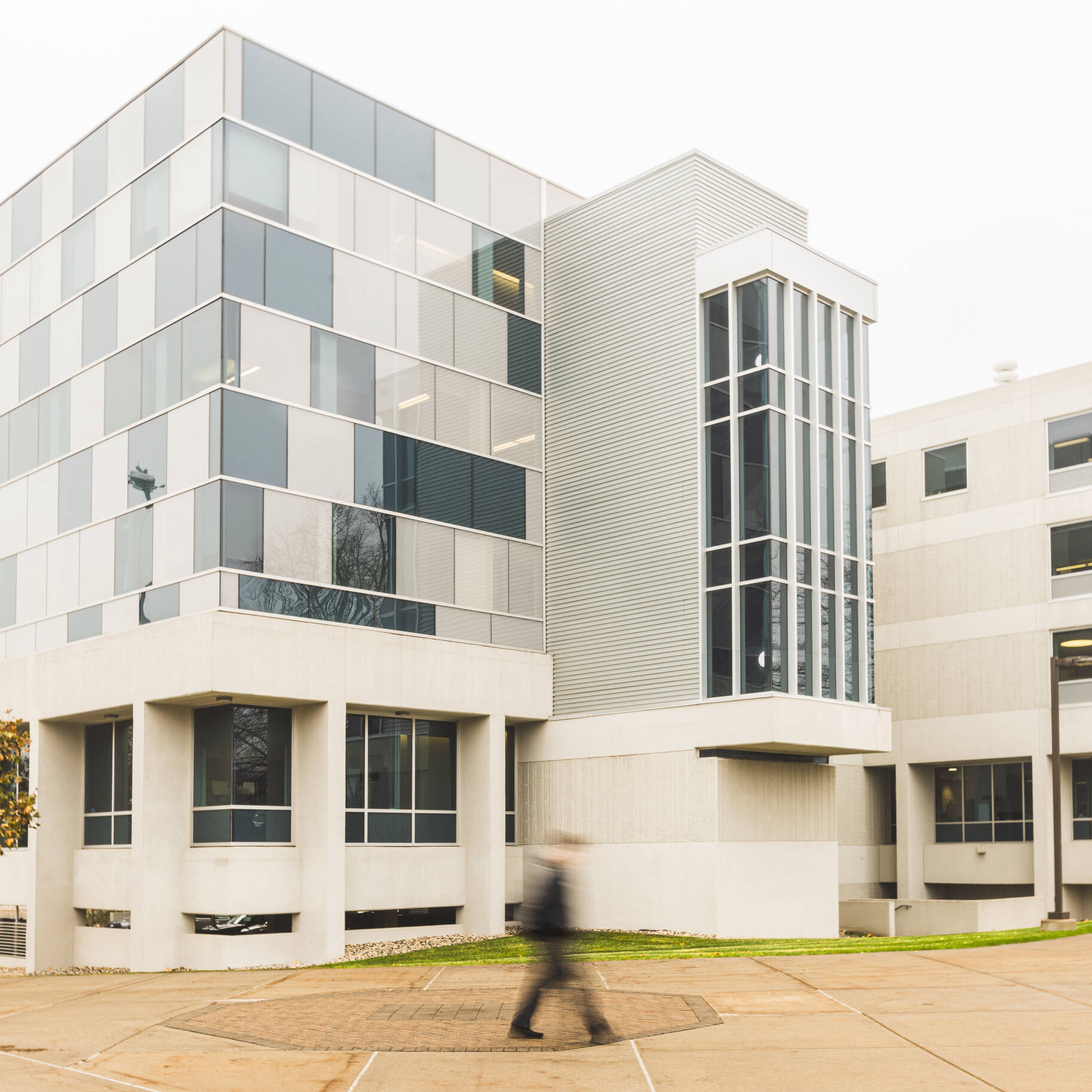 Building with person walking by
